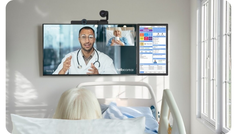 Doctor on hospital room screen during virtual consultation with patient
