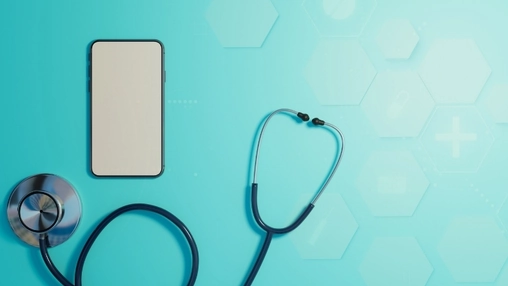 Mobile phone and medical stethoscope arranged on a teal surface with health technology graphics behind